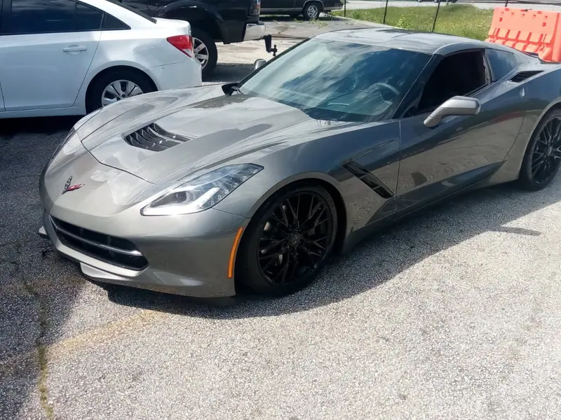 A Corvette Stingray outside the shop after work was finished
